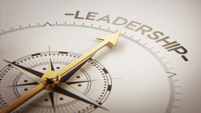 Stock photo of a compass pointing in the direction of leadership.