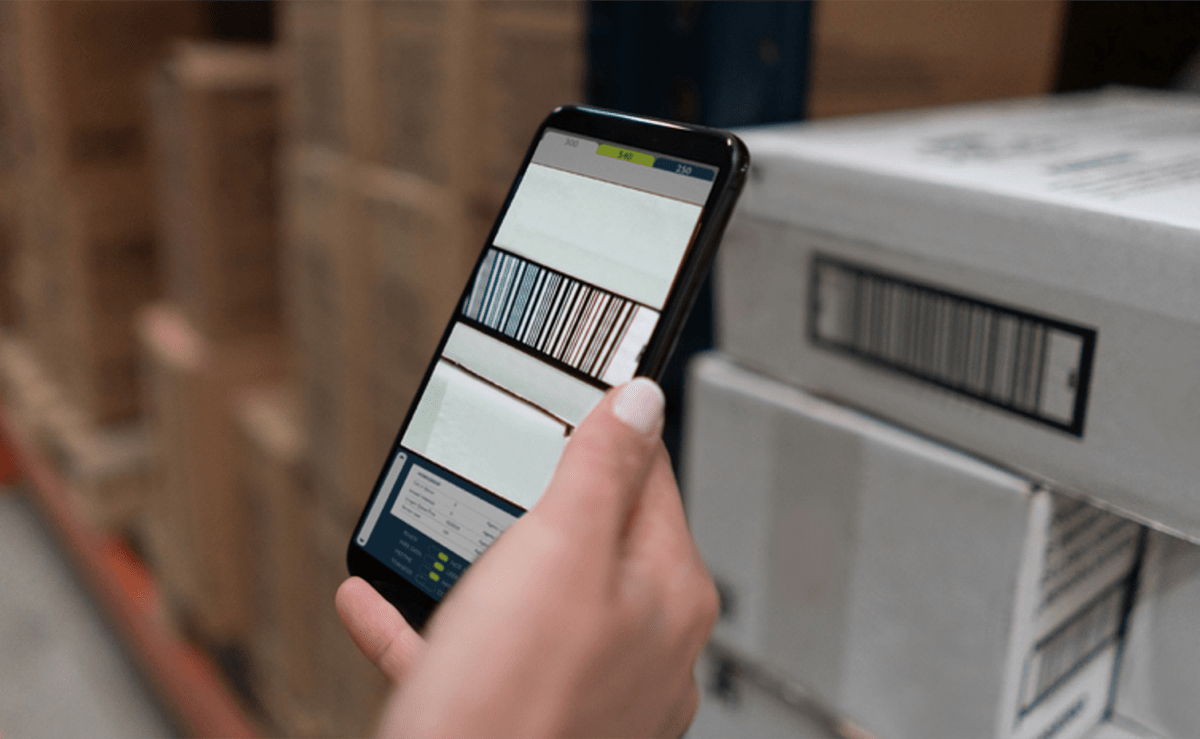 Stock photo of a smartphone scanning a barcode.