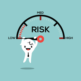 Stock image of a cartoon character in a tie hanging on the needle of a 'RISK' meter as it sits at 'LOW'.